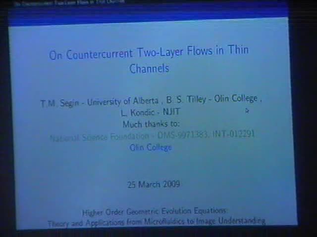 On countercurrent two-layer flows in thin channels Thumbnail