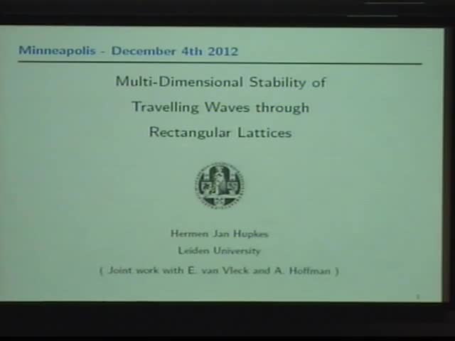 Multi-Dimensional Stability of Traveling Waves Through Rectangular Lattices Thumbnail