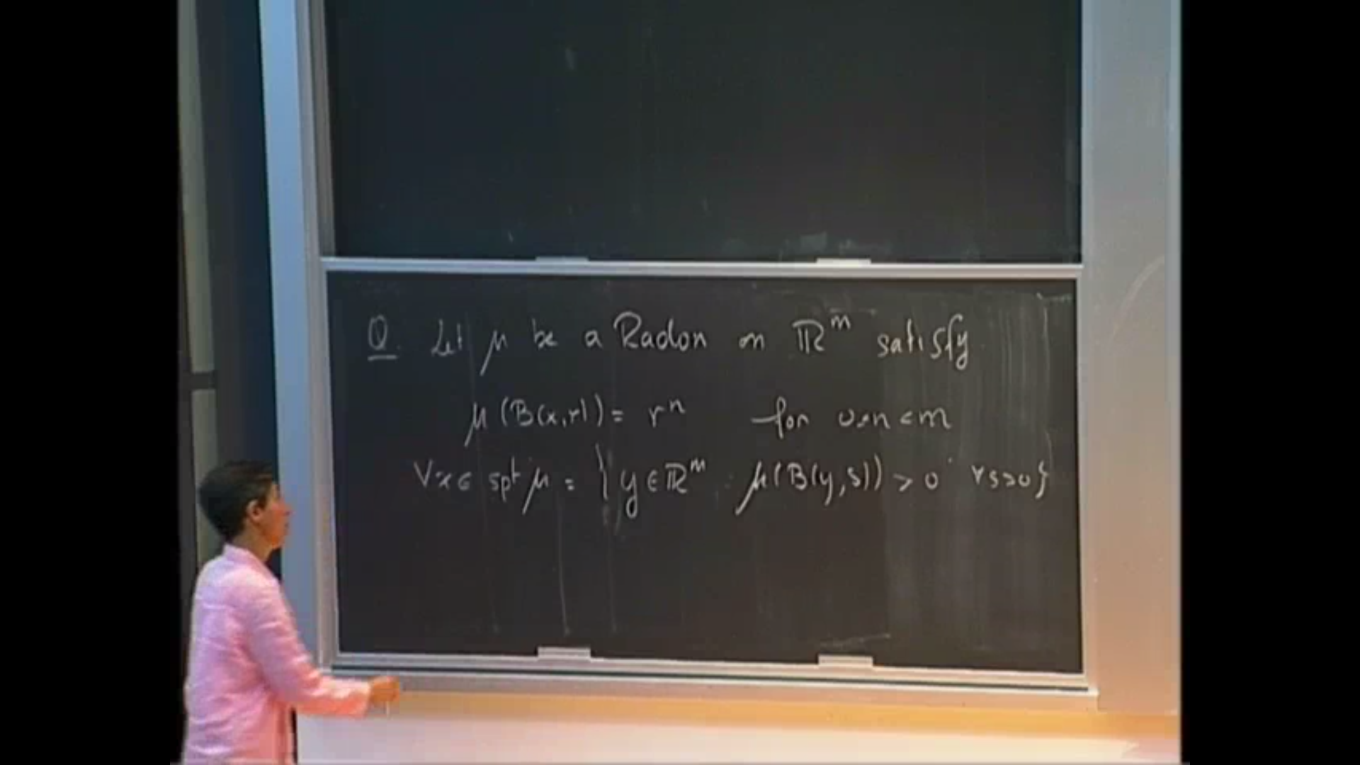 Determining the regularity of a measure via the Wasserstein distance Thumbnail